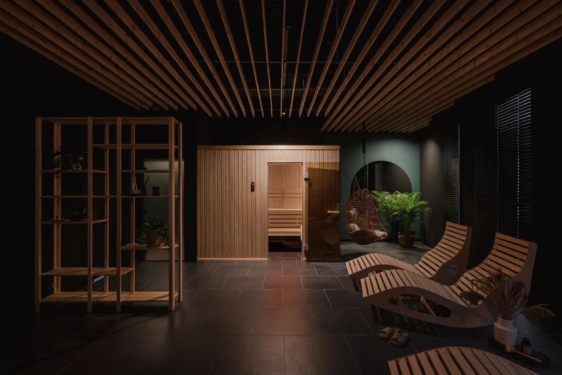 Relaxation zone with wooden loungers in Sokolska 30 Towers